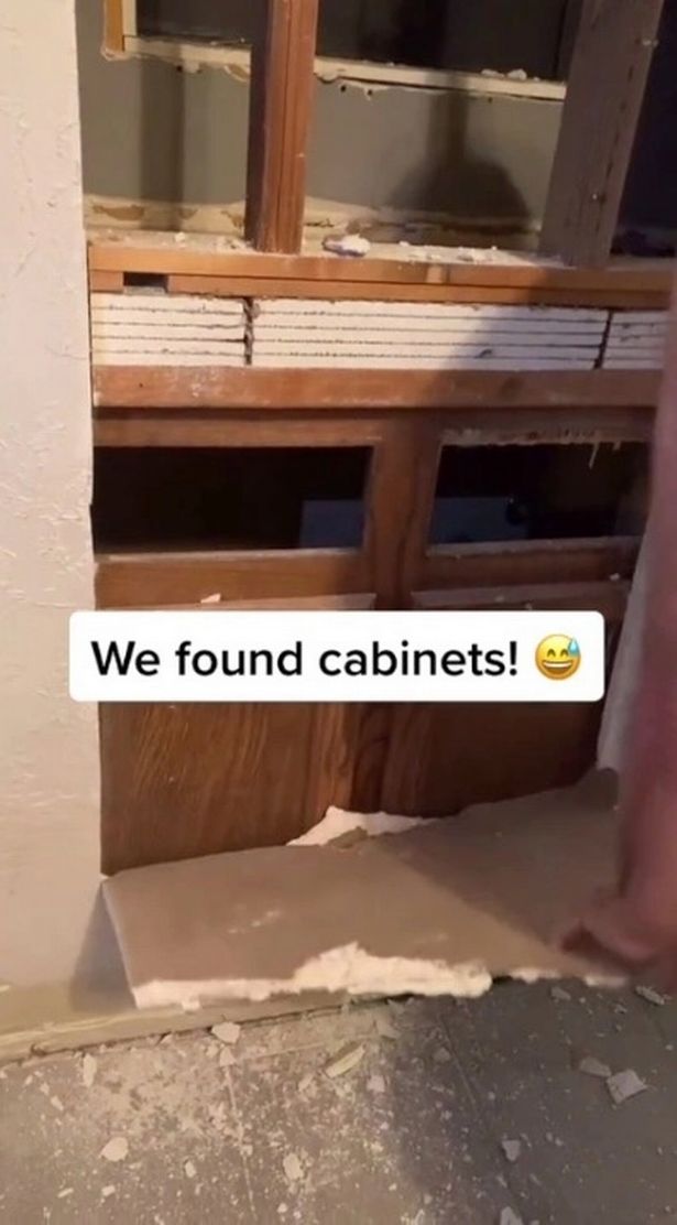 Look inside the wall where the cabinets are