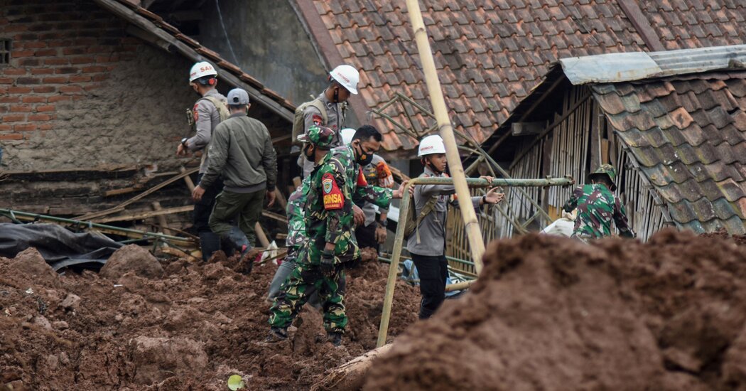 At least 12 people were killed in two landslides in Indonesia